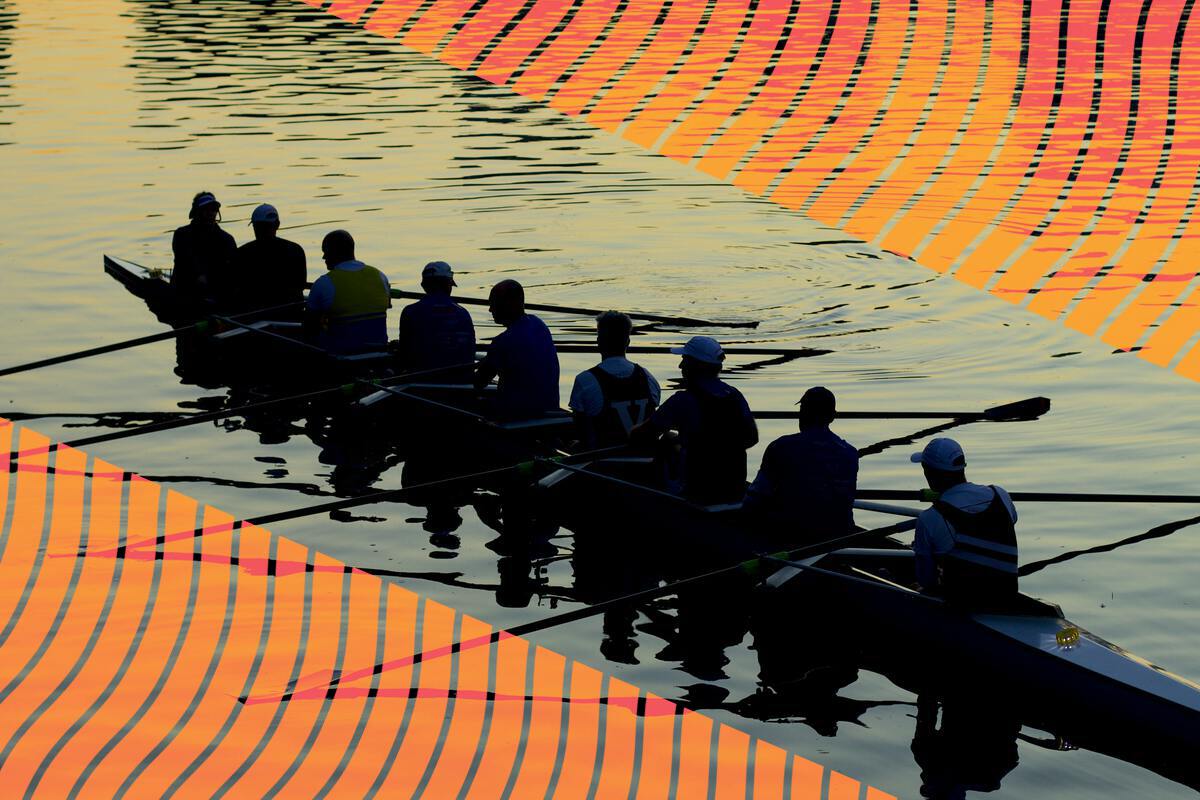 A team of rowers in a boat