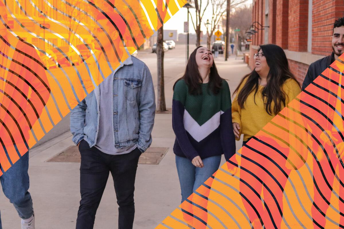 A group of students walking down the street